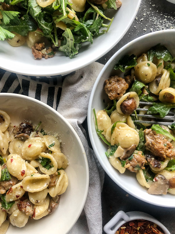 Creamy Mushroom Sausage Orecchiette is the ultimate comfort food. Make it for your guests! Find the recipe on Shutterbean.com