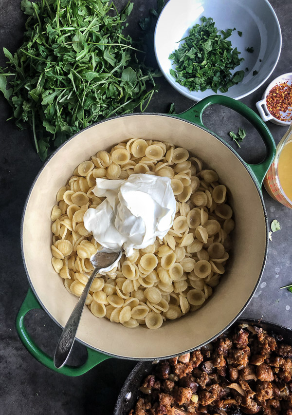 Creamy Mushroom Sausage Orecchiette is the ultimate comfort food. Make it for your guests! Find the recipe on Shutterbean.com