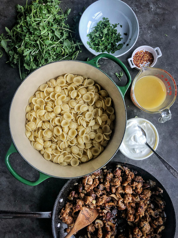 Creamy Mushroom Sausage Orecchiette is the ultimate comfort food. Make it for your guests! Find the recipe on Shutterbean.com