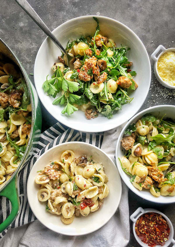 Creamy Mushroom Sausage Orecchiette is the ultimate comfort food. Make it for your guests! Find the recipe on Shutterbean.com