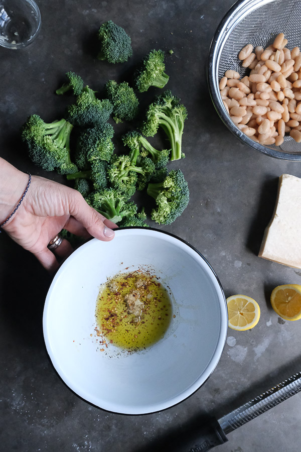 Need a quick/simple dinner? Make Roasted Broccoli with White Bean with Lemon. Put an egg on it! Recipe on Shutterbean.com!