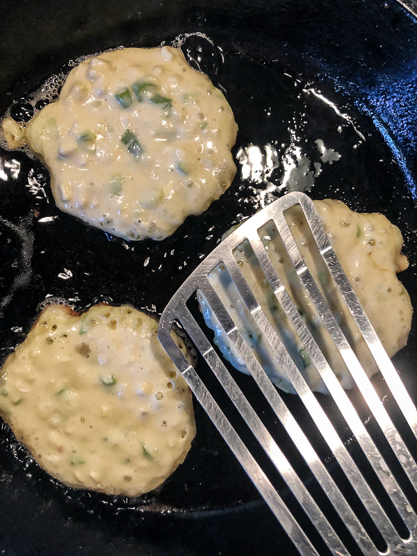 Sweet Corn Fritters with a salad makes for a healthy summer meal! Find the simple recipe on Shutterbean.com!