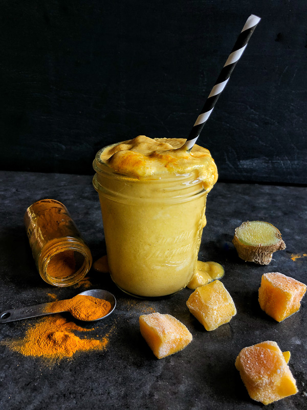 Mango Turmeric Smoothie is a great/healthy way to start the day. Coconut milk is the base, making it completely vegan! Find the recipe on Shutterbean.com