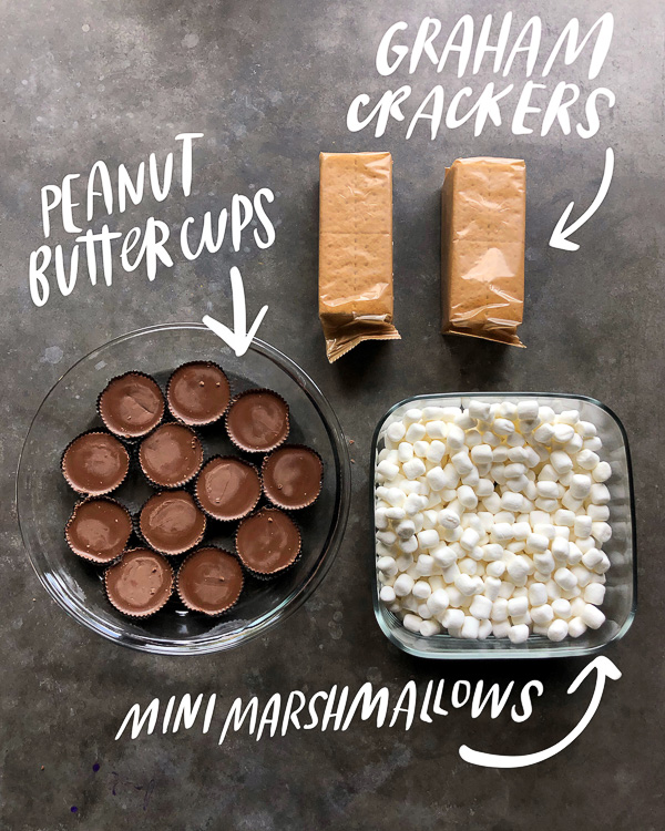 Win at dessert with this SIMPLE Peanut Butter S'Mores Dip made with peanut butter cups. Recipe on Shutterbean.com! 