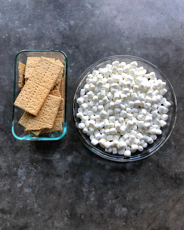 Win at dessert with this SIMPLE Peanut Butter S'Mores Dip made with peanut butter cups. Recipe on Shutterbean.com! 