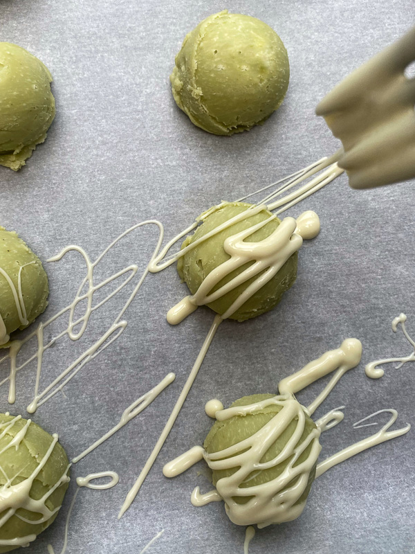 White Chocolate Matcha Truffles- a wonderful addition to your holiday gift giving arsenal! Find the recipe on Shutterbean.com