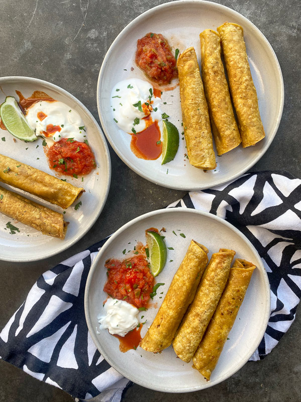 Bean and Cheese Taquitos are a simple vegetarian meal to whip up! Find the recipe on Shutterbean.com