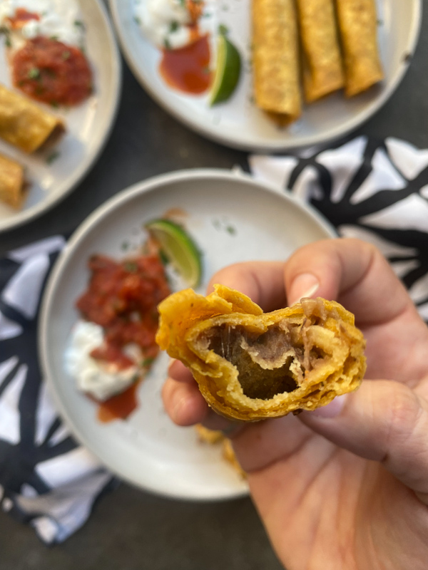 Bean and Cheese Taquitos are a simple vegetarian meal to whip up! Find the recipe on Shutterbean.com