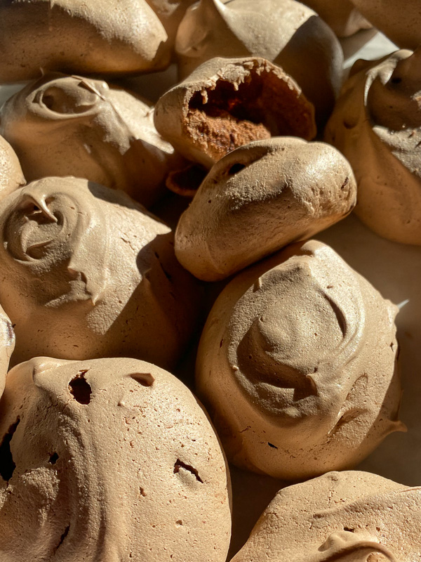 Mocha Meringues with chocolate chips inside! Find this gluten free recipe on Shutterbean.com!