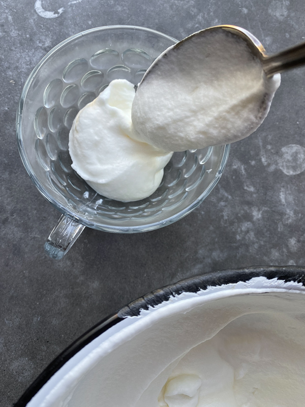 White Chocolate Mousse combines fresh whipping cream with melted white chocolate for a sweet treat! Find the recipe on Shutterbean.com