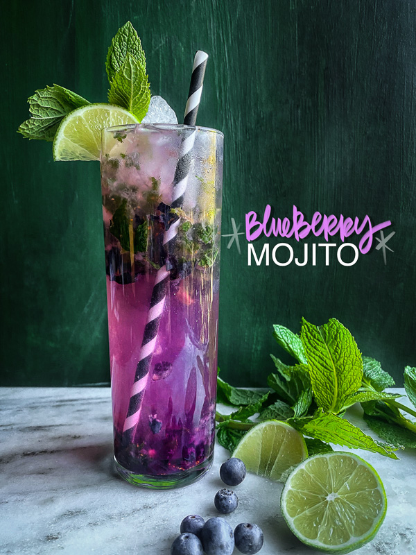 Blueberry Mojito is a refreshing cocktail! Muddled mint and blueberries add color to your life! Find the recipe on Shutterbean.com