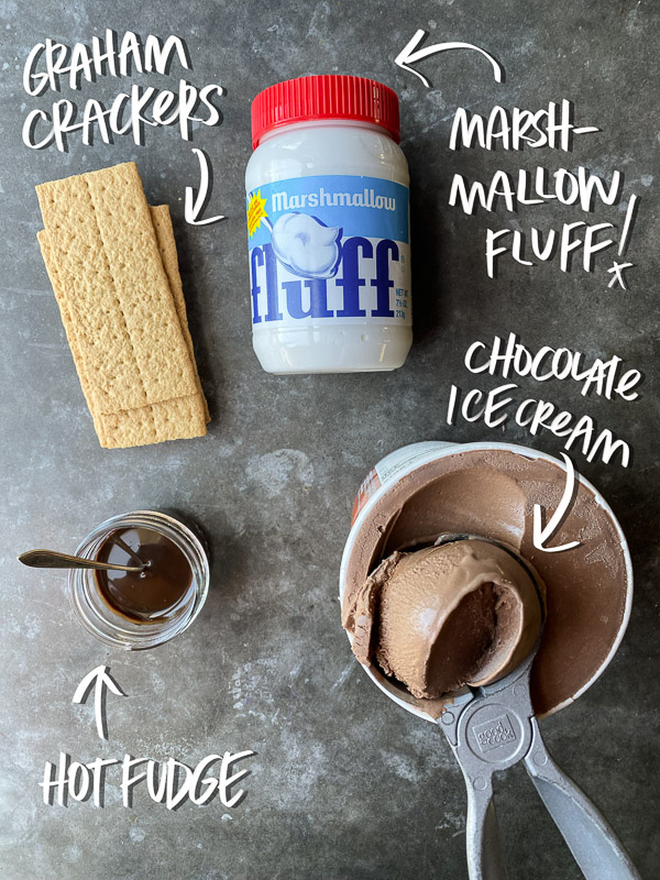 S'mores Sundaes are a combination of chocolate ice cream, marshmallow fluff and hot fudge! Don't forget the graham crackers. Find the recipe on Shutterbean! 