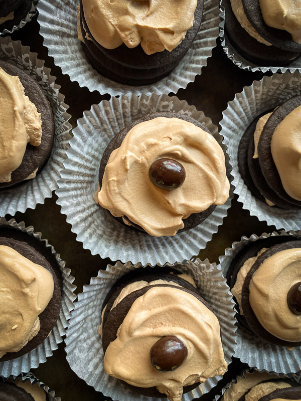 Mocha Icebox Cupcakes - layers for mocha whipped cream with chocolate wafers! A great make-ahead dessert for a party! Find the recipe on Shutterbean.com