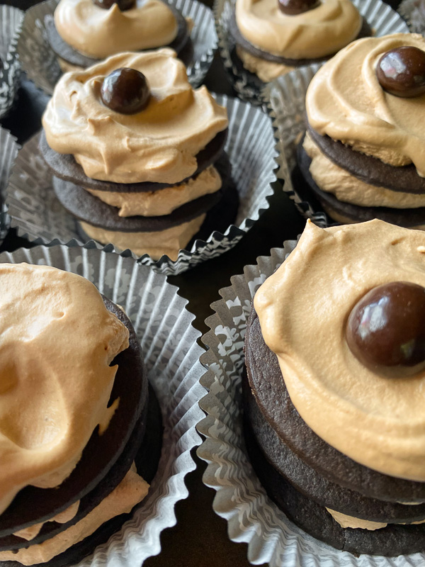 Mocha Icebox Cupcakes - layers for mocha whipped cream with chocolate wafers! A great make-ahead dessert for a party! Find the recipe on Shutterbean.com