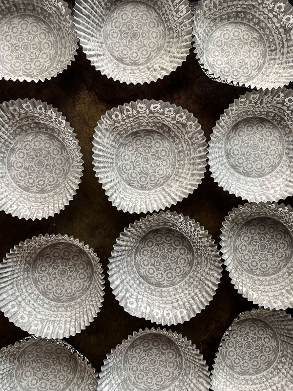 Mocha Icebox Cupcakes - layers for mocha whipped cream with chocolate wafers! A great make-ahead dessert for a party! Find the recipe on Shutterbean.com