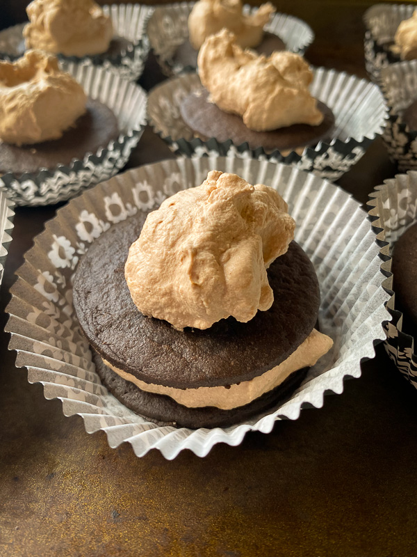 Mocha Icebox Cupcakes - layers for mocha whipped cream with chocolate wafers! A great make-ahead dessert for a party! Find the recipe on Shutterbean.com