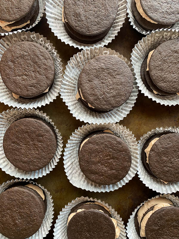 Mocha Icebox Cupcakes - layers for mocha whipped cream with chocolate wafers! A great make-ahead dessert for a party! Find the recipe on Shutterbean.com