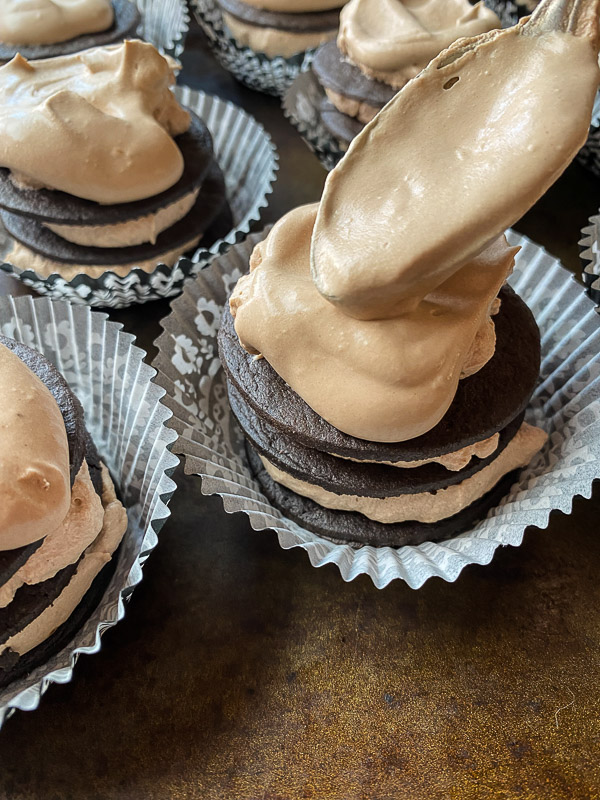 Mocha Icebox Cupcakes - layers for mocha whipped cream with chocolate wafers! A great make-ahead dessert for a party! Find the recipe on Shutterbean.com