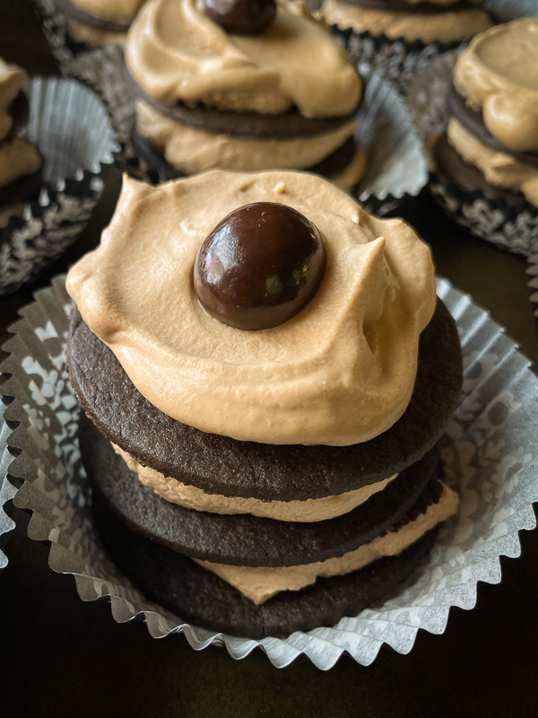 Mocha Icebox Cupcakes - layers for mocha whipped cream with chocolate wafers! A great make-ahead dessert for a party! Find the recipe on Shutterbean.com