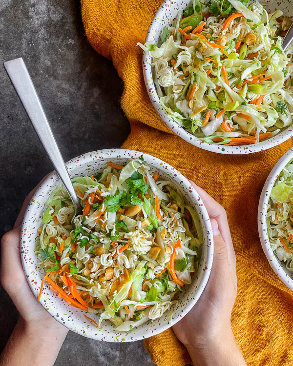 Crunchy Ramen and Cabbage Salad is a great way to get your vegetables in! Find the recipe on Shutterbean.com