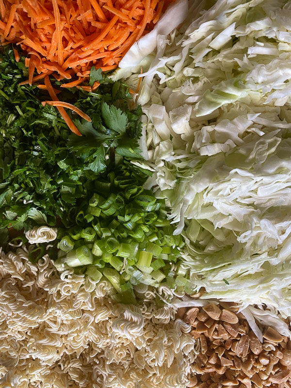 Crunchy Ramen and Cabbage Salad is a great way to get your vegetables in! Find the recipe on Shutterbean.com