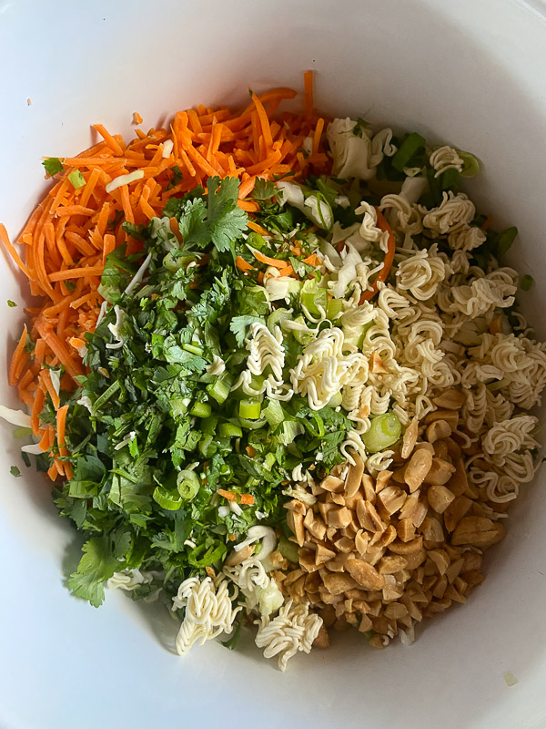 Crunchy Ramen and Cabbage Salad is a great way to get your vegetables in! Find the recipe on Shutterbean.com