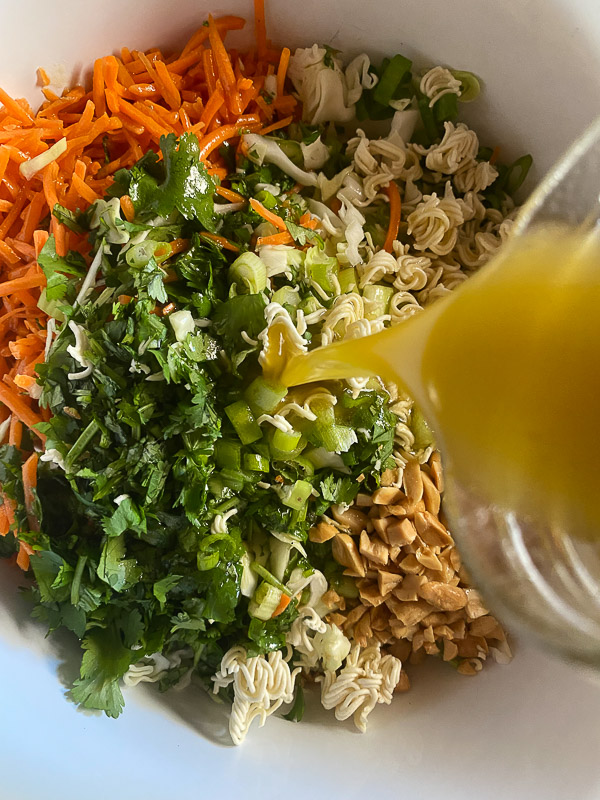 Crunchy Ramen and Cabbage Salad is a great way to get your vegetables in! Find the recipe on Shutterbean.com