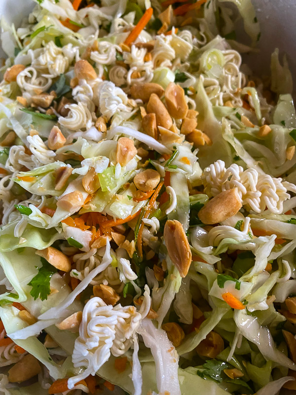 Crunchy Ramen and Cabbage Salad is a great way to get your vegetables in! Find the recipe on Shutterbean.com