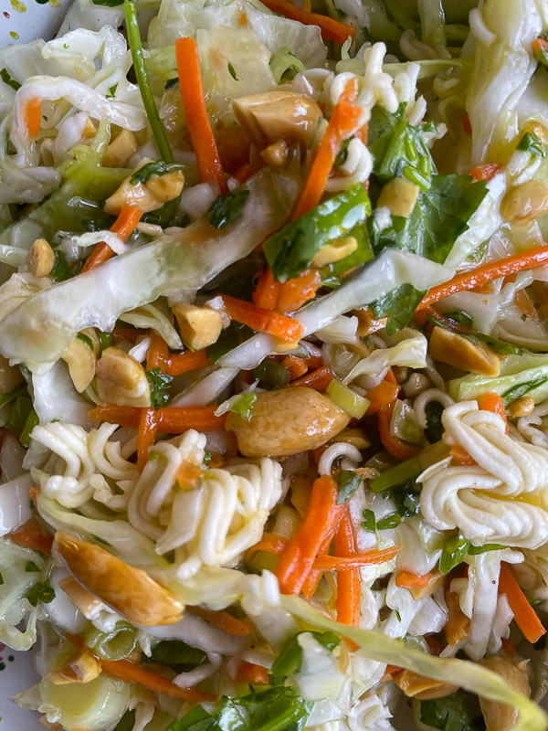 Crunchy Ramen and Cabbage Salad is a great way to get your vegetables in! Find the recipe on Shutterbean.com