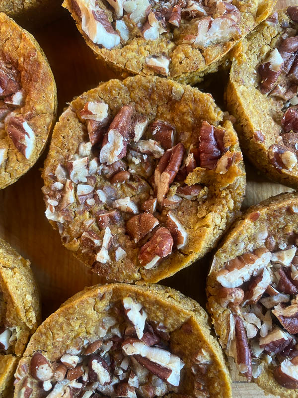 Baked Pumpkin Oatmeal Cups are a portable breakfast dream come true! Find the recipe on Shutterbean.com