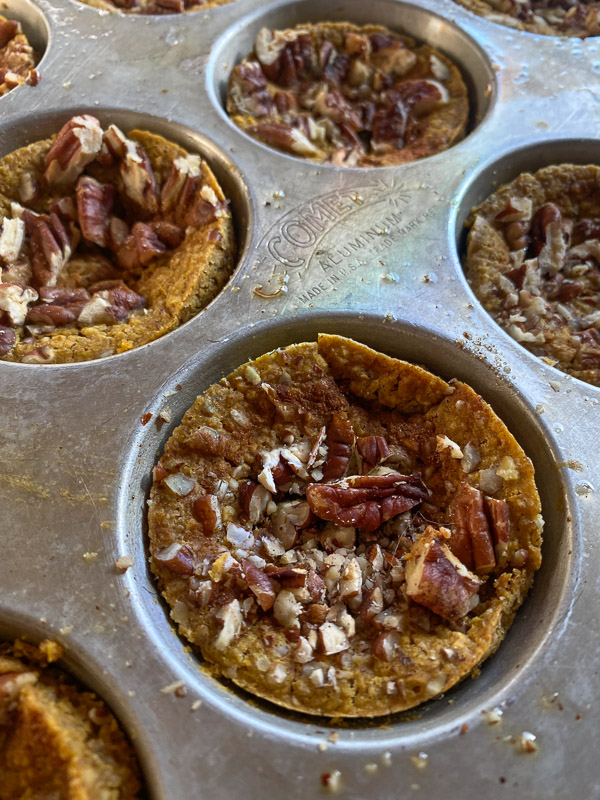 Baked Pumpkin Oatmeal Cups are a portable breakfast dream come true! Find the recipe on Shutterbean.com