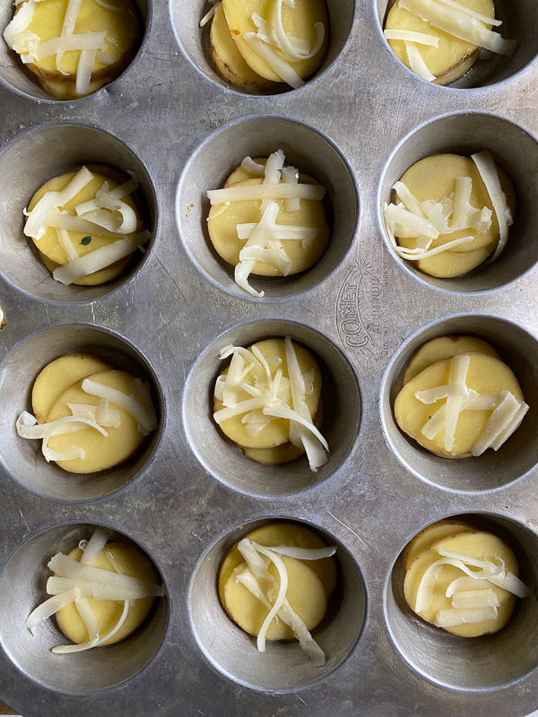 Cheesy Potato Stacks is a fun way to serve potatoes! Find the recipe on Shutterbean.com