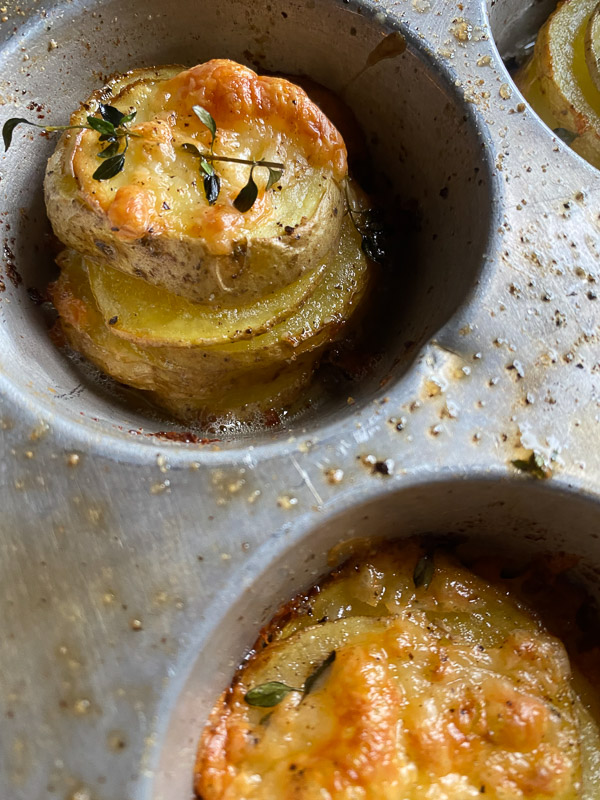 Cheesy Potato Stacks is a fun way to serve potatoes! Find the recipe on Shutterbean.com