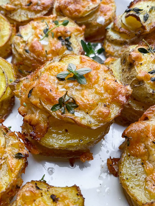 Cheesy Potato Stacks is a fun way to serve potatoes! Find the recipe on Shutterbean.com