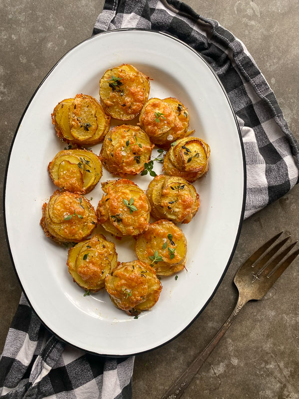 Cheesy Potato Stacks is a fun way to serve potatoes! Find the recipe on Shutterbean.com