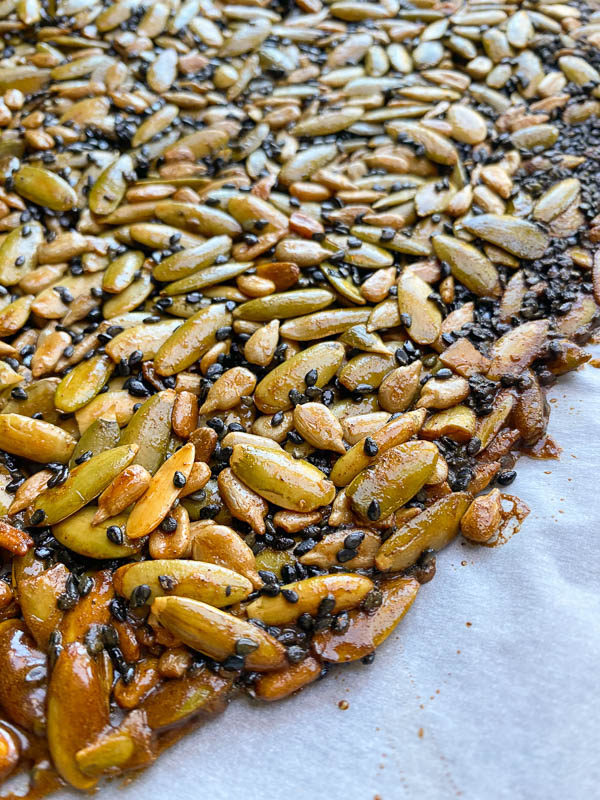 Pumpkin Seed Brittle to add to your cheese boards or homemade goodie bags! Find the recipe at Shutterbean.com