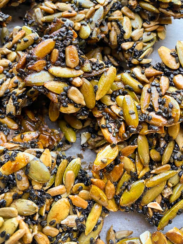 Pumpkin Seed Brittle to add to your cheese boards or homemade goodie bags! Find the recipe at Shutterbean.com