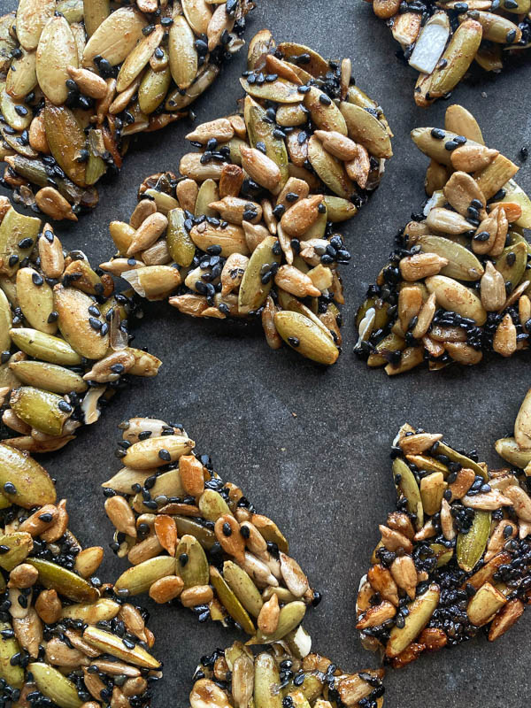 Pumpkin Seed Brittle to add to your cheese boards or homemade goodie bags! Find the recipe at Shutterbean.com