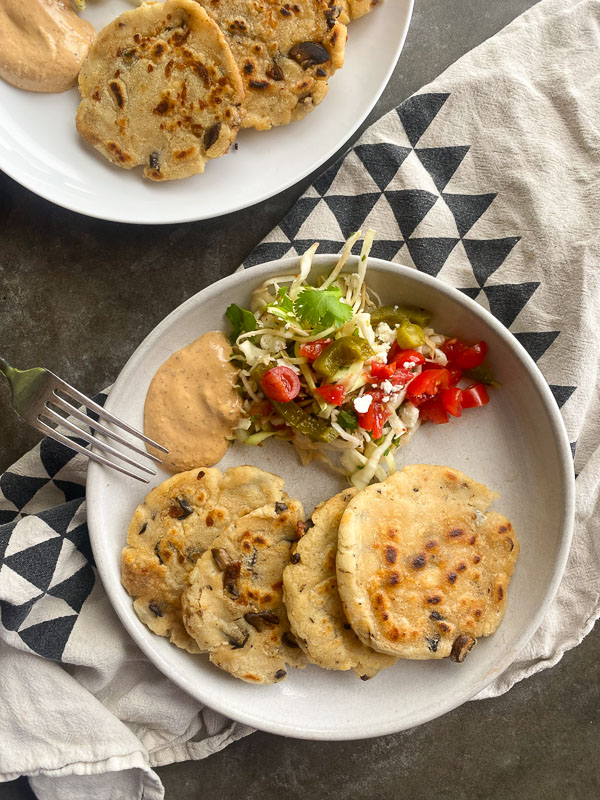 Mushroom Pupusas are a great vegetarian/gluten free meal for you and your family. Find the recipe on Shutterbean.com