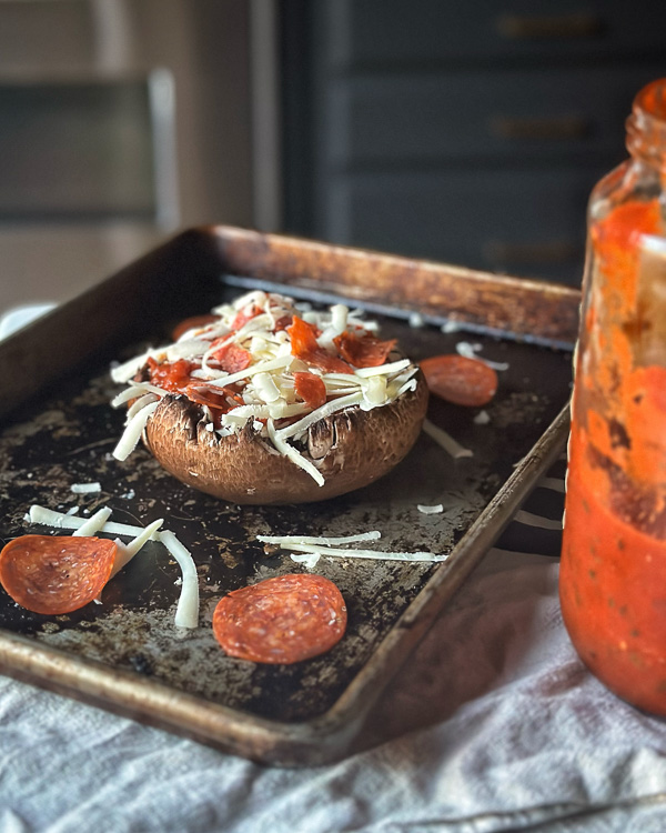 Portobello Mushroom Pizzas will scratch the pizza itch if you're living the low carb/gluten free lifestyle. It's made with mushrooms! Find the recipe on Shutterbean.com