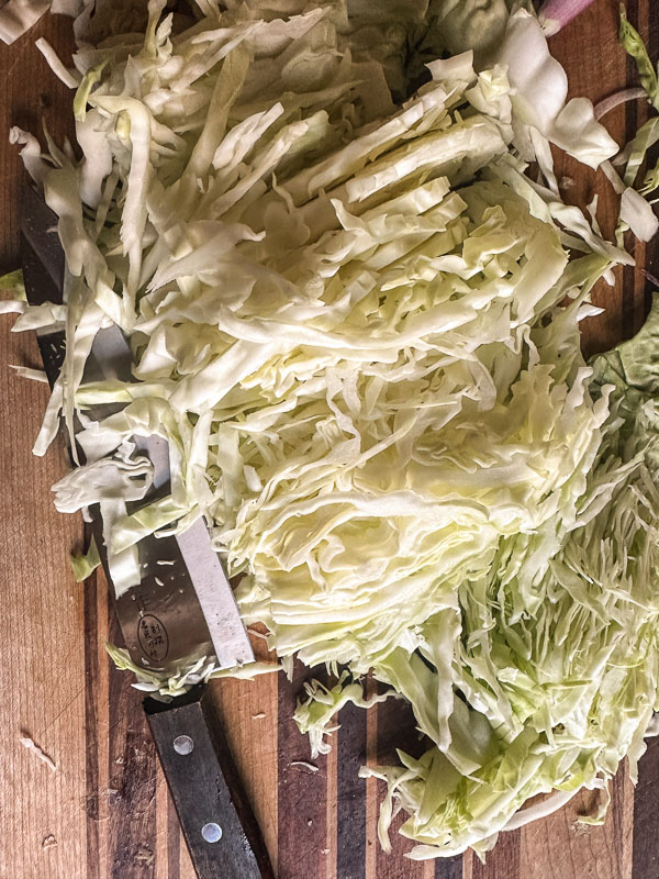 Carnival Coleslaw is sweet and tangy and flavored with celery seeds. Find the recipe on Shutterbean.com