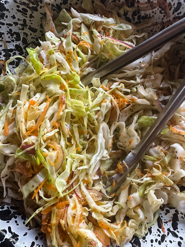 Carnival Coleslaw is sweet and tangy and flavored with celery seeds. Find the recipe on Shutterbean.com