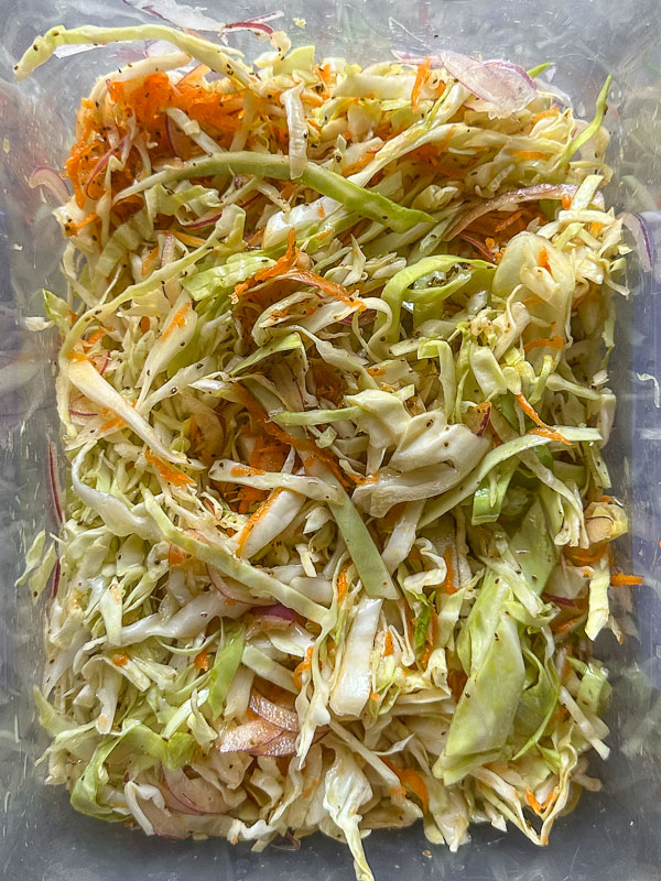 Carnival Coleslaw is sweet and tangy and flavored with celery seeds. Find the recipe on Shutterbean.com