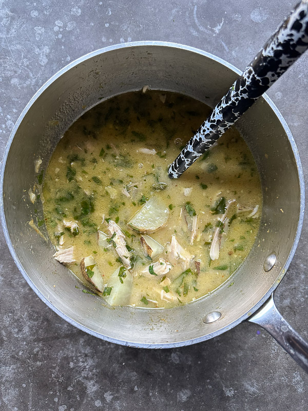 Curry Coconut Chicken Soup is packed with flavor! Tracy from Shutterbean shows you how to make this weeknight curry! 