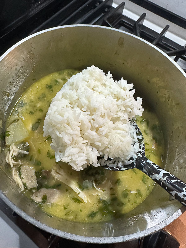 Curry Coconut Chicken Soup is packed with flavor! Tracy from Shutterbean shows you how to make this weeknight curry! 