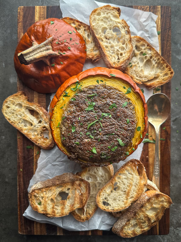 Cheesy Mushroom Baked Pumpkin is an incredible appetizer for your Autumn and Winter parties. Pair with crusty bread and DIP! Find the recipe on Shutterbean.com