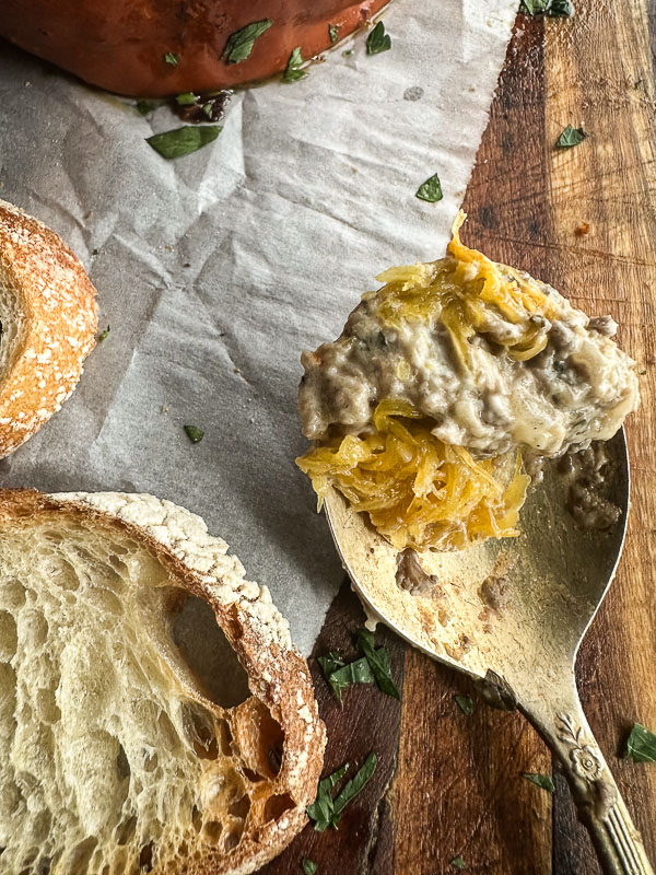 Cheesy Mushroom Baked Pumpkin is an incredible appetizer for your Autumn and Winter parties. Pair with crusty bread and DIP! Find the recipe on Shutterbean.com