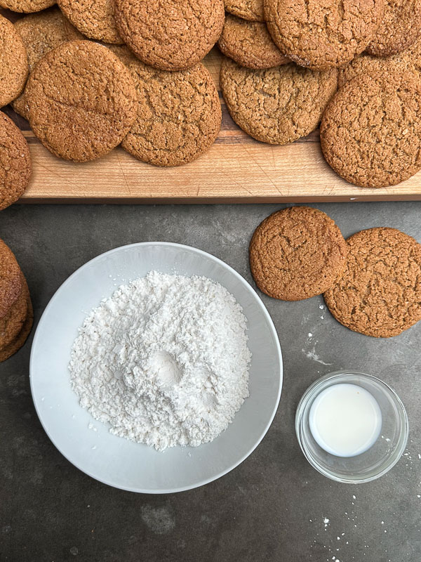 Gluten Free Chewy Ginger Molasses Cookies are made with a combo of oat, almond and gluten free flour! Find the recipe on Shutterbean.com