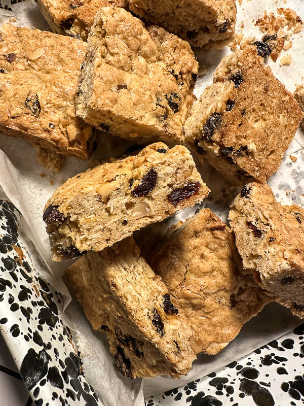 Oatmeal Raisin Bars taste like a cross between a blondie and an oatmeal raisin cookie. Find the recipe for this treat on Shutterbean.com! 