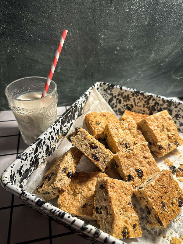 Oatmeal Raisin Bars taste like a cross between a blondie and an oatmeal raisin cookie. Find the recipe for this treat on Shutterbean.com! 